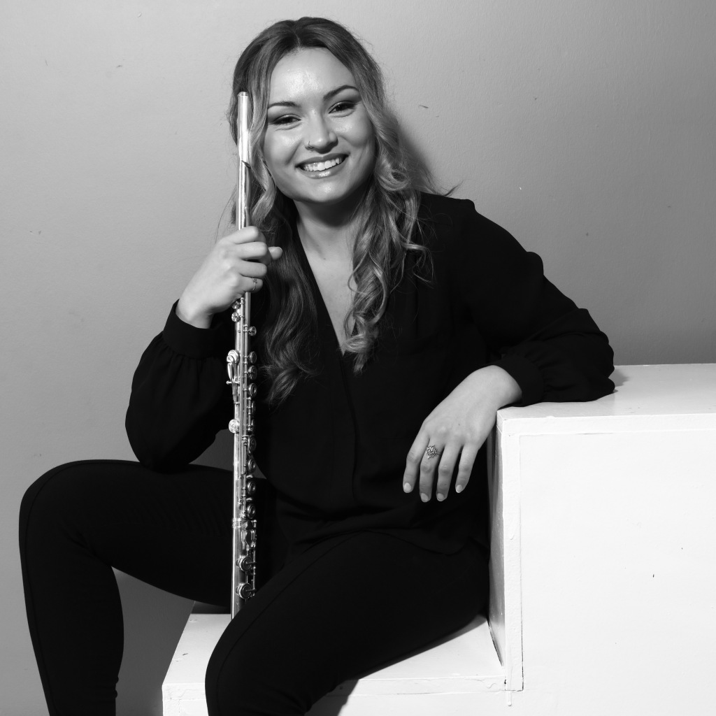 Woman holding a flute