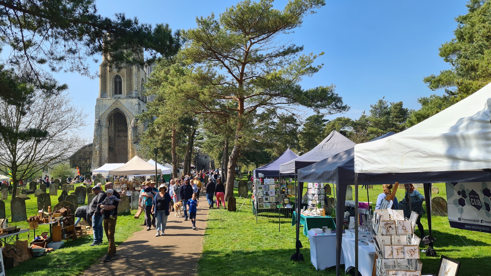 Stalls in Abbey grounds with people