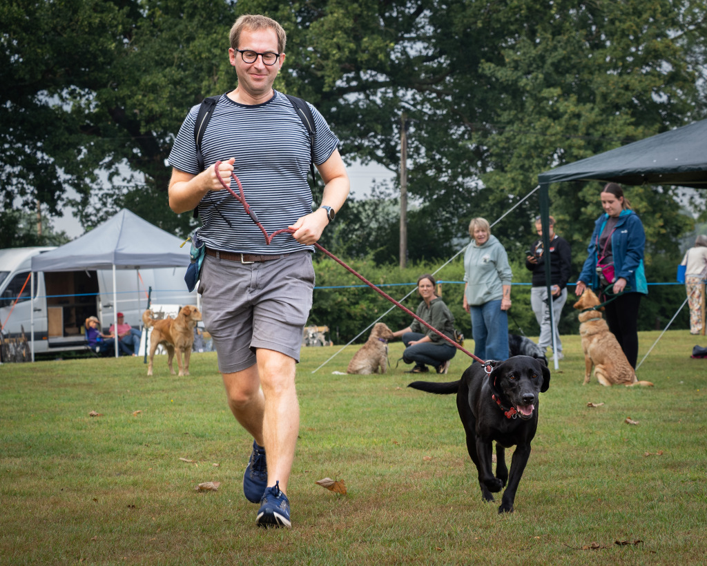 Man running with his dog