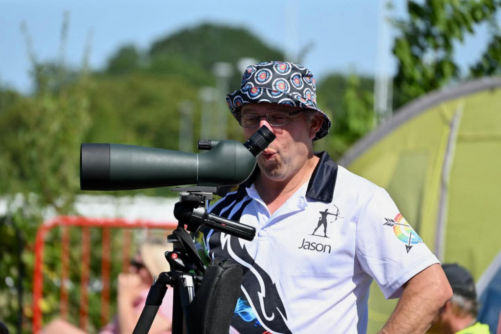 Man making a funny face and holding a camera