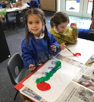 Girl painting a caterpillar