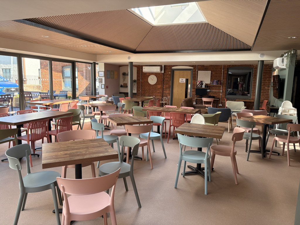 Newly renovated café with lots of tables and chairs