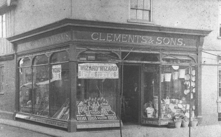 A black-and-white photo of a shop front