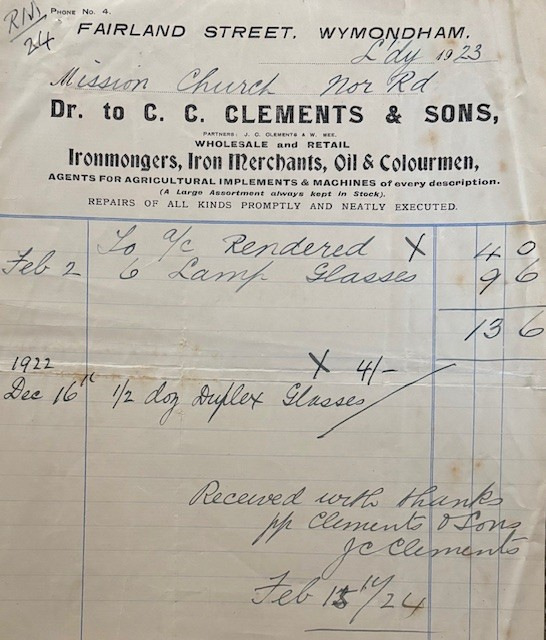 A handwritten shop receipt