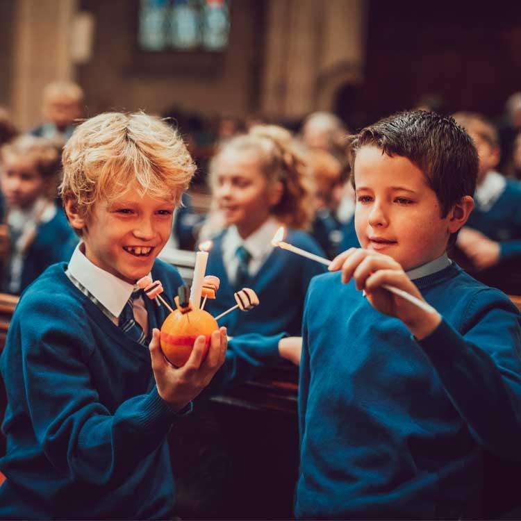 Lighting a Christingle orange