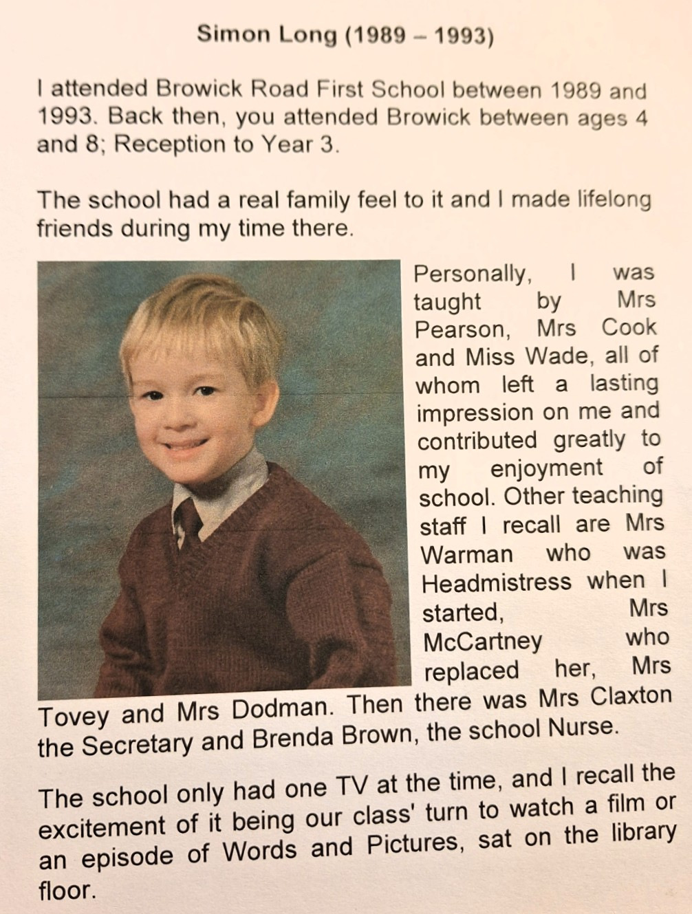 Still of a young boy with his school biography around him