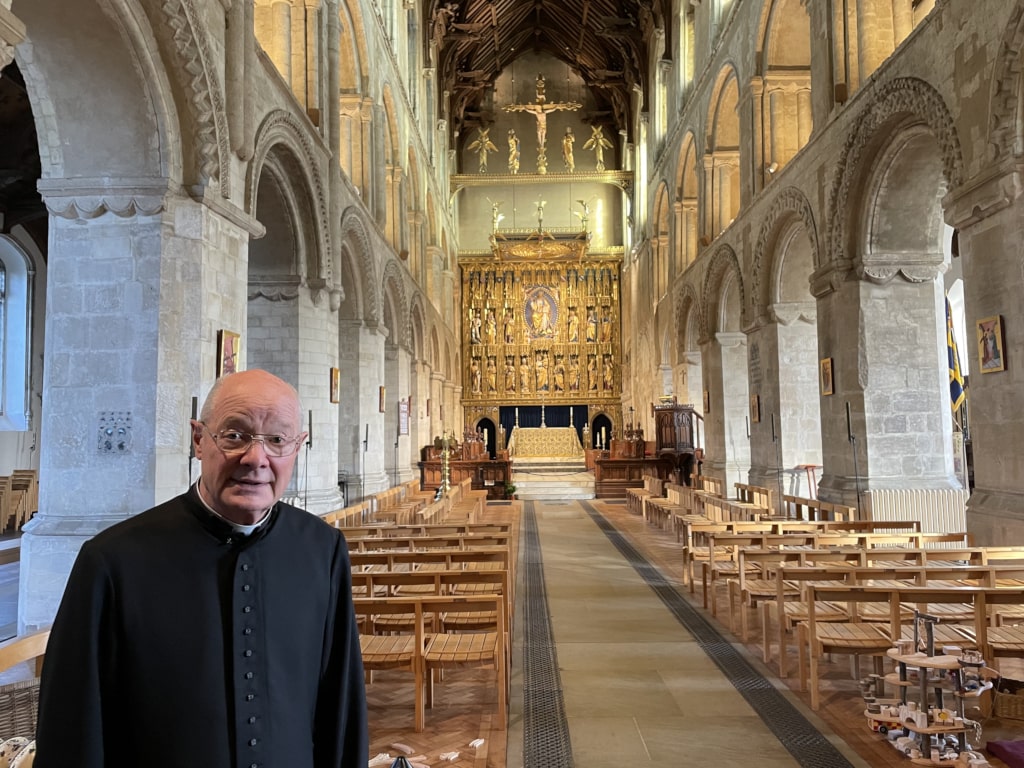 Father Christopher inside the Wymondham Abbey