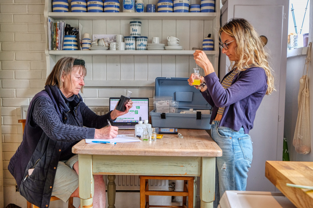 Two women conduct tests