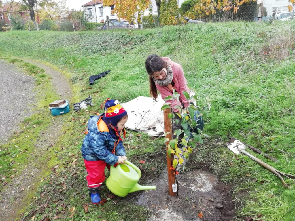 Primary school children tree planting