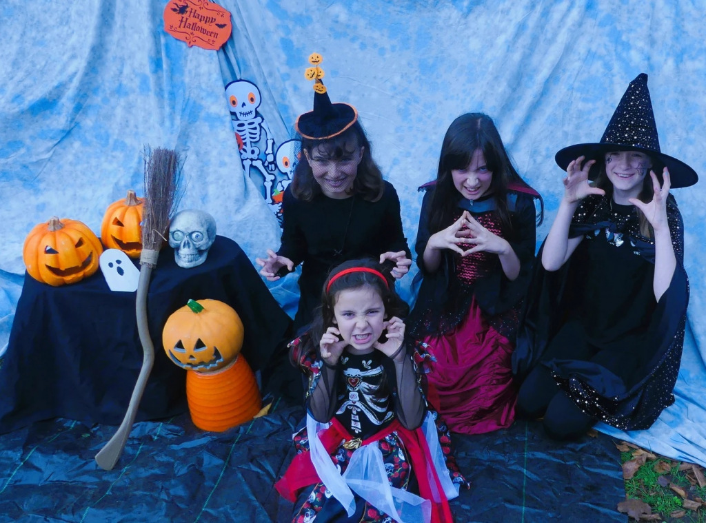 Children in witch costumes for Halloween