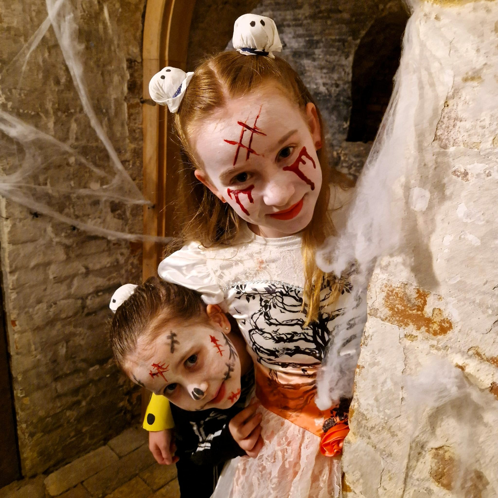 Two children in Halloween makeup