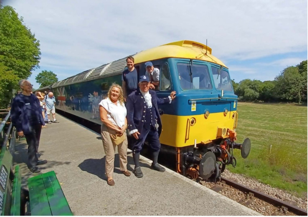People standing in front of a train