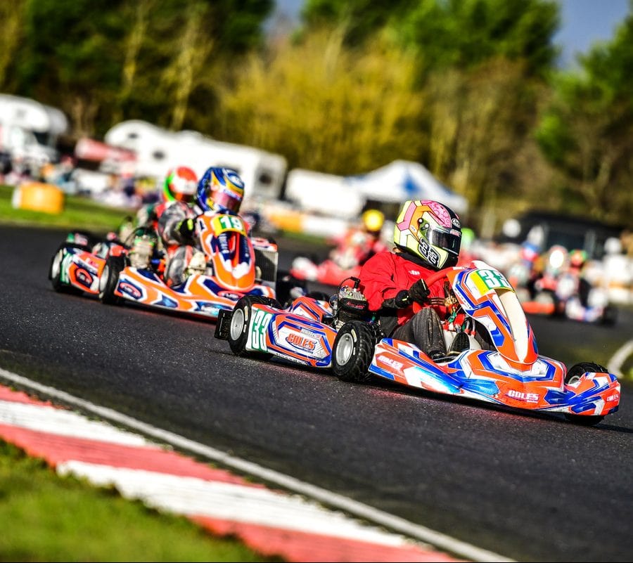 Macie driving a go kart