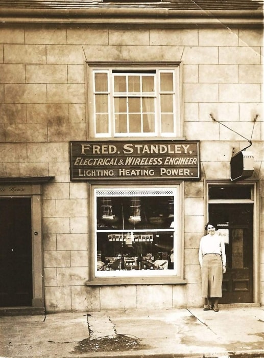 Old sepia tone photo of Fred Stadley shop