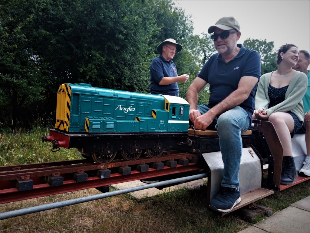 Mid-Norfolk Railway mini train with passengers 2