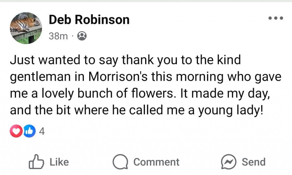 Facebook post thanking a man for spontaneously giving the writer flowers