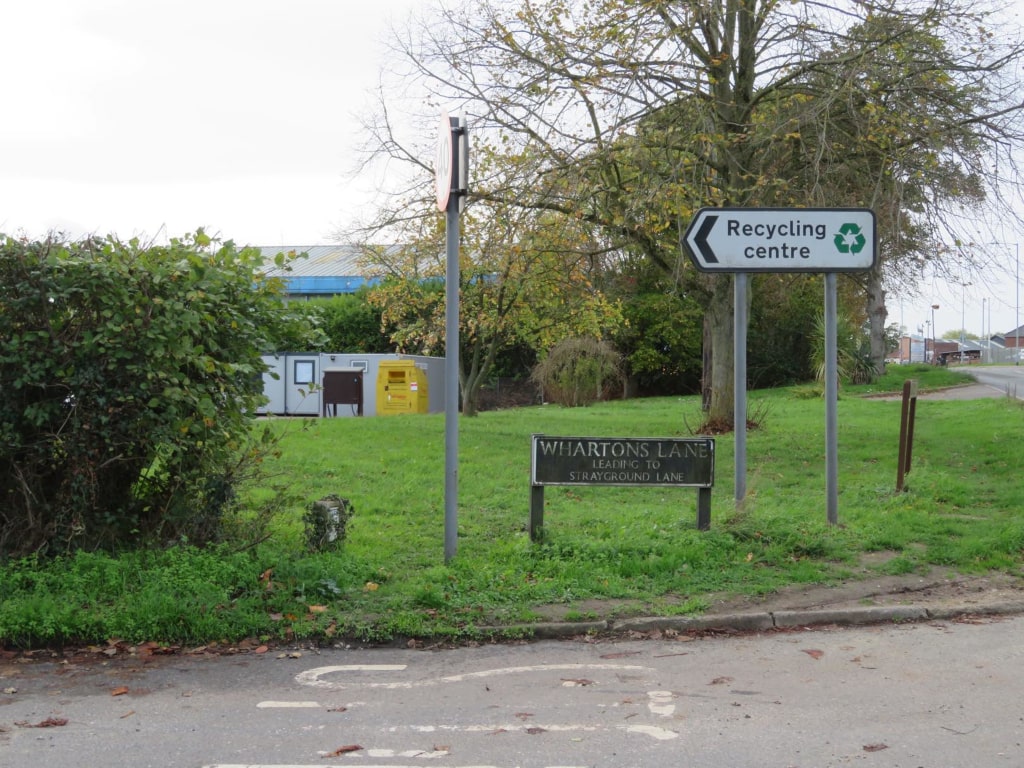A signpost for the recycling centre in Wymondham