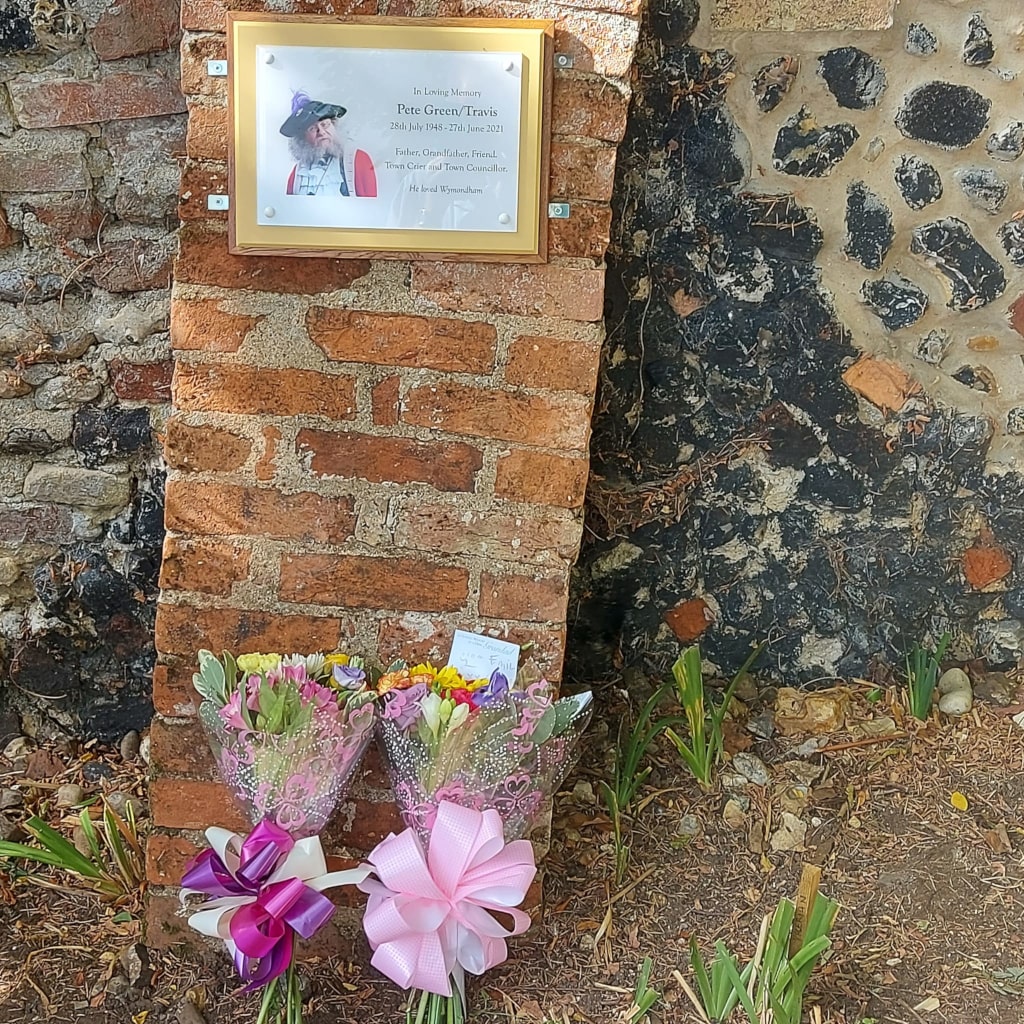 Flowers placed at the plaque