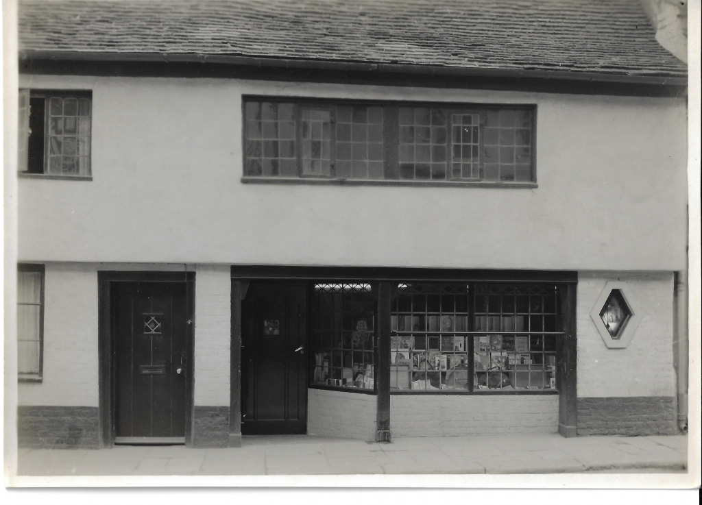 Greyscale photo of a shop front