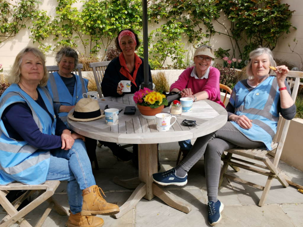 Volunteers sitting at a round table