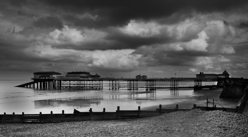 A black and white photo of Cromer Pier