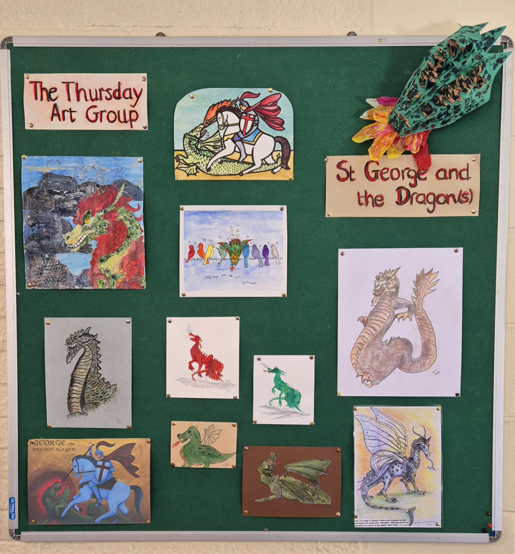 A wall of drawings and paintings of dragons