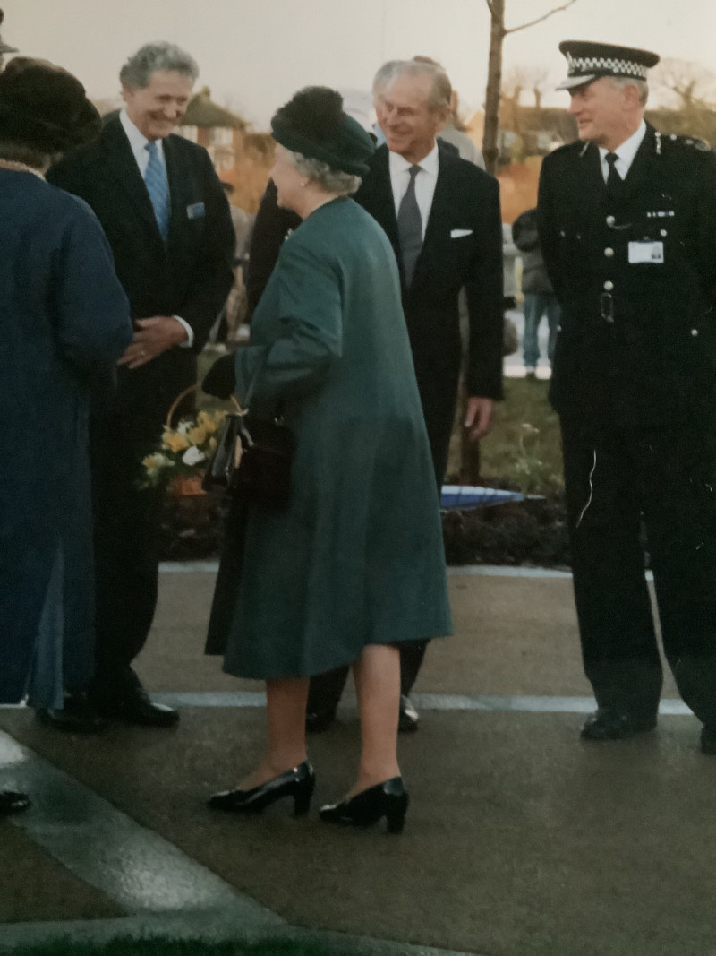 The Queen talking to police