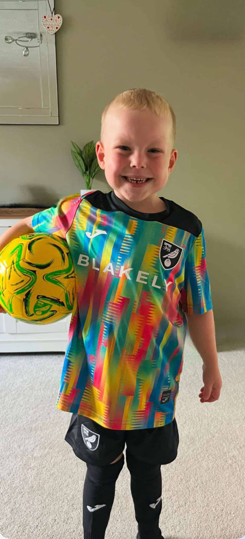 Boy holding a football