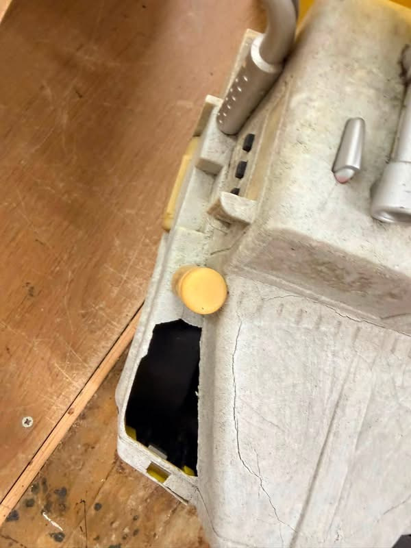 A toy truck with a hole in it