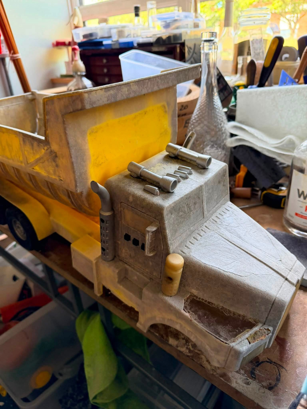 A half-restored toy truck