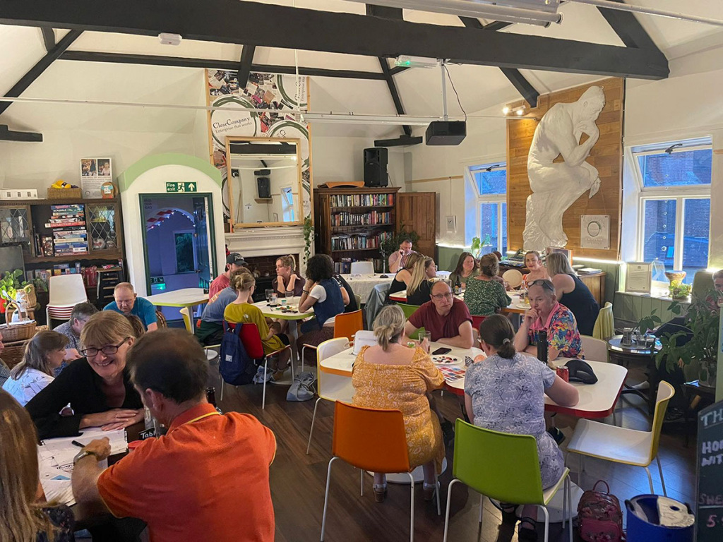 People milling in a cafe