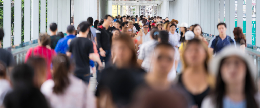 People walking down a corridor