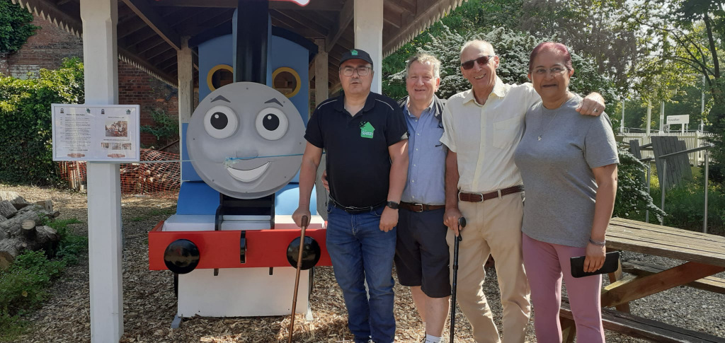 Andrew Clarke, Julian Ashby, Dave Gilham and Amy Tyler standing with Thomas the Tank Engine