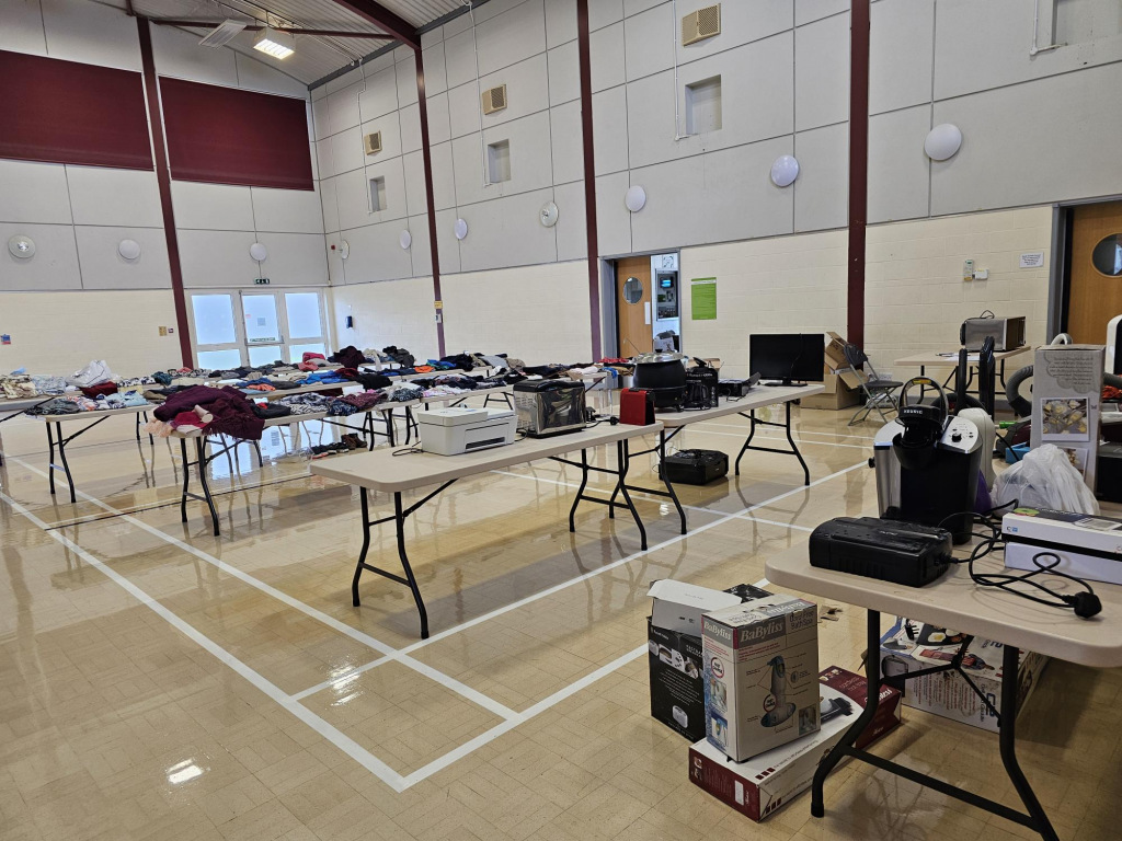 Empty hall with stalls and desks