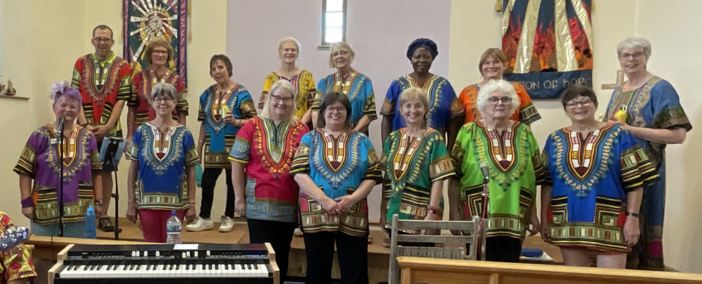gospel choir in bright clothing