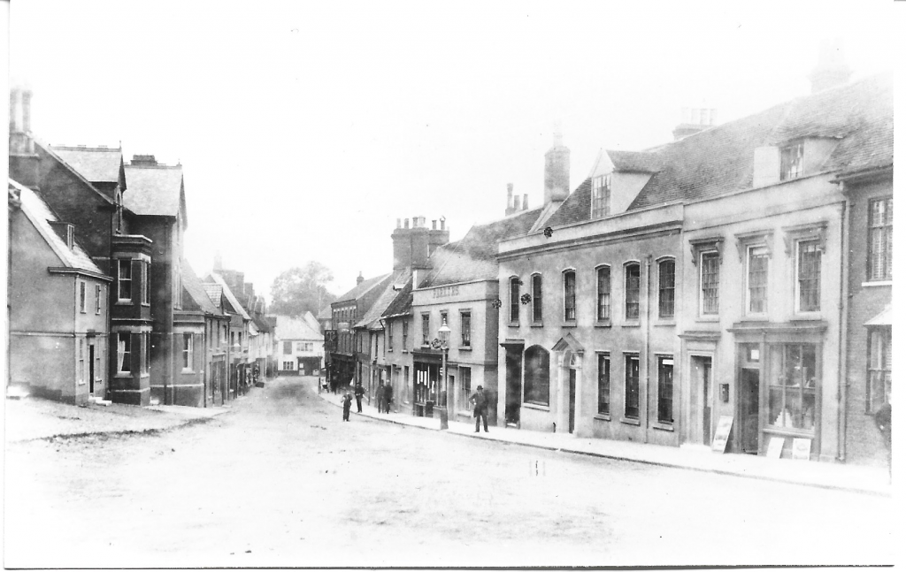 Old black and white photo of Wymondham market street