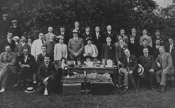 Men sitting together for a photo 