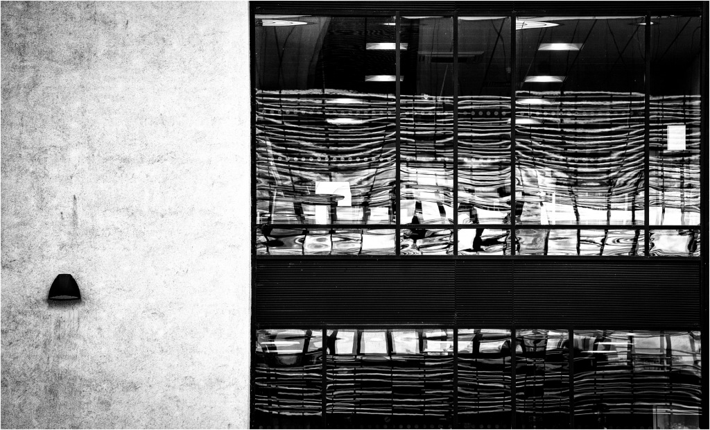 Black and white still of a cafe